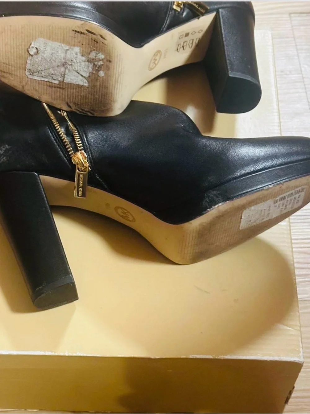 Michael Kors Sammy Platform Black Leather Ankle Booties with Gold Zipper.